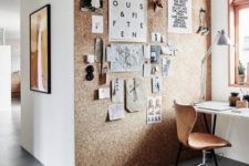 a cork wall is a statement solution that you can use to hang photos on