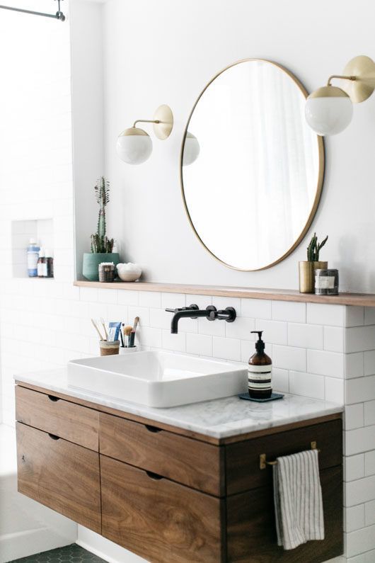 a floating wooden vanity with a stylish stone countertop will completely change the look of your bathroom