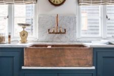 09 navy cabinets with brass knobs and a copper hammered sink for a vintage kitchen