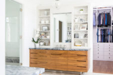 10 The master bathroom is neutral, with marble countertops
