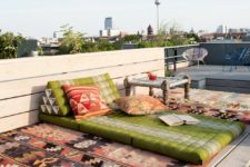 10 The terrace features a boho space for relaxing and a sitting space