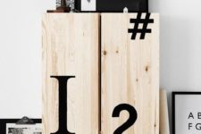 10 an IKEA Ivar cabinet decorated with black typography looks very bold and modern