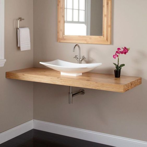 such a simple floating vanity can be easily DIYed and doesn't require much space