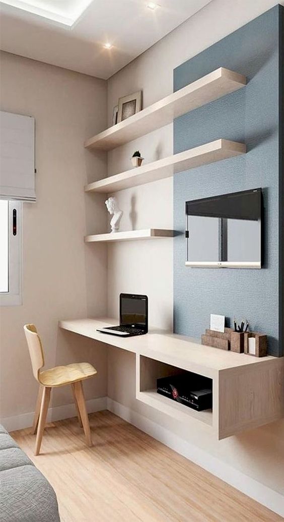 a floating deks is a nice idea for a small nook, this one also features some storage