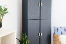 11 a tall cabinet of several Ivar items painted navy and spruced up with gold touches – handles and legs