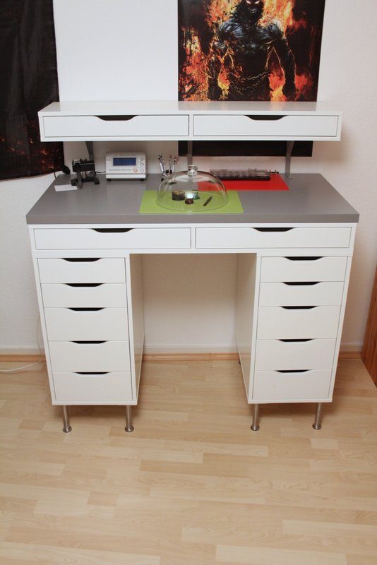 an Alex desk made standing with an additional Ekby Alex unit on top