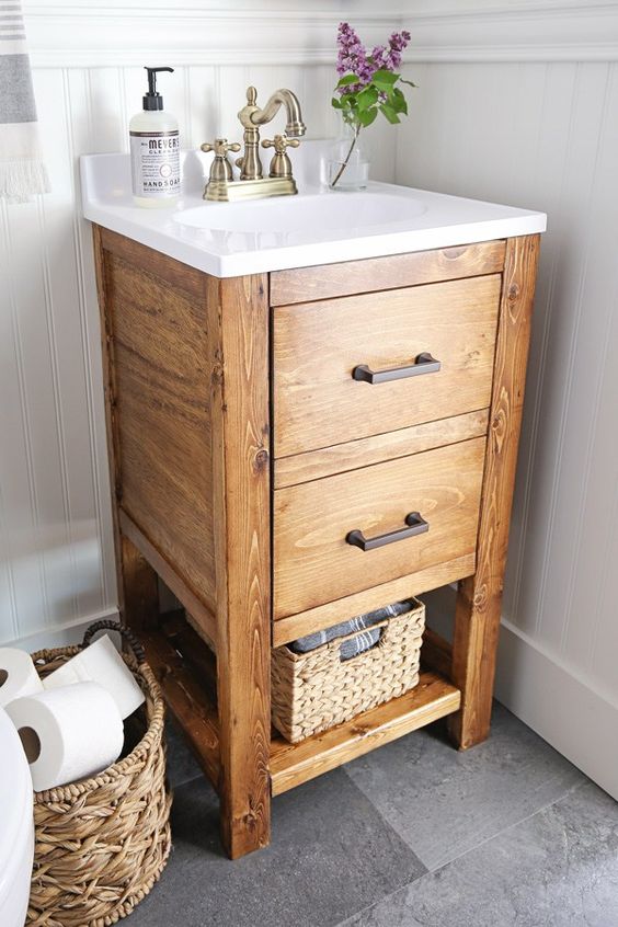 this little wooden vanity with much open storage and drawers is a great idea for a small nook
