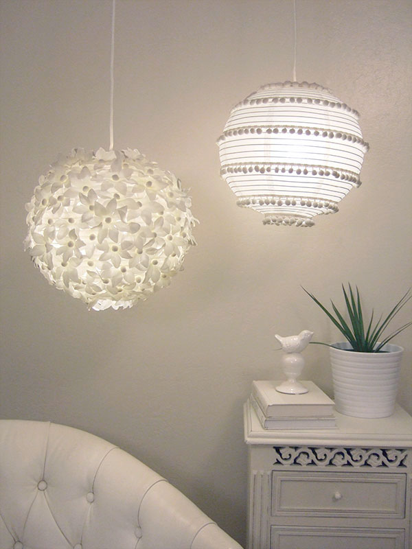 a duo of chic pendant lamps, a flower one and a boho pompom one, both made of IKEA Regolit lampshades
