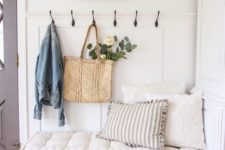 14 a cozy vintage bench with a super soft cushion gives a tone to this entryway