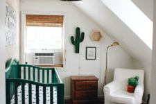 14 a crib painted emerald changes the look of the nursery, and emerald accessories add a vivacious touch