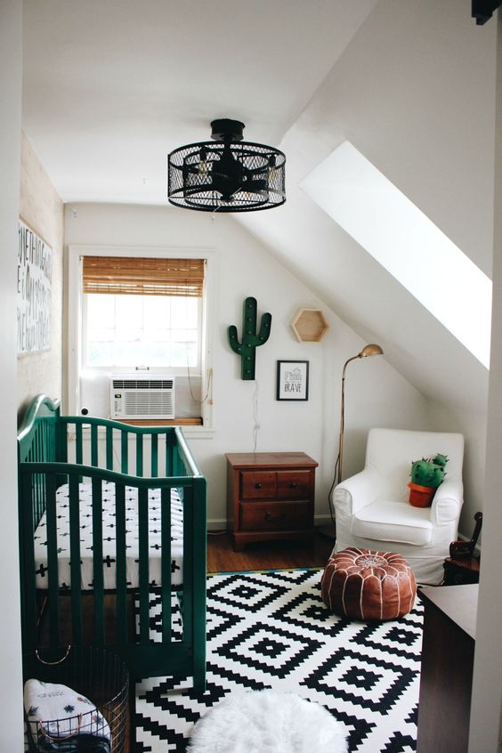 a crib painted emerald changes the look of the nursery, and emerald accessories add a vivacious touch