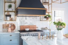 14 marble-inspired white stone countertops give a light and airy feeling to the kitchen
