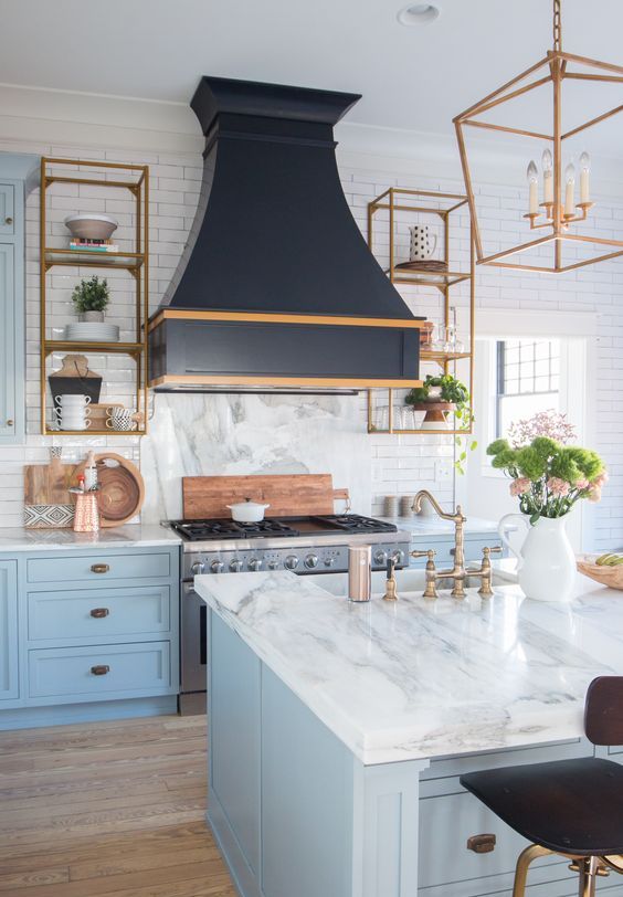 marble-inspired white stone countertops give a light and airy feeling to the kitchen