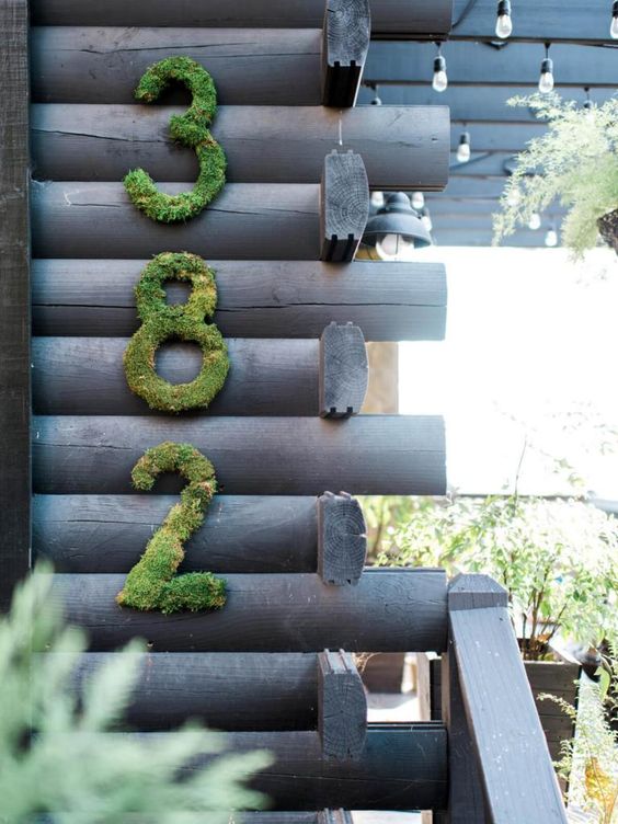 moss house numbers on the wall are a nice idea for a rustic house, it's a beautiful natural touch you may go for