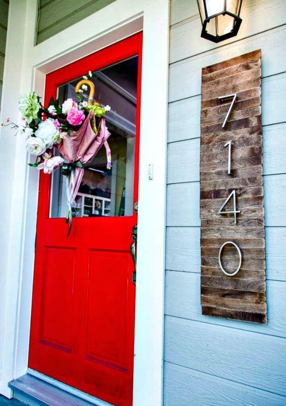 A wooden sign with numbers isn't only a mid century modern but also rustic decoration for your home