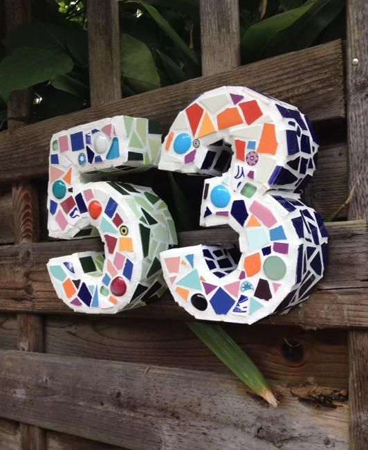 colorful terrazzo-inspired house numbers design is a trendy idea as terrazzo is currently on top among the trends