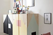 a cool way to use colors in a kids room by renovating a plain pine wood cabinet