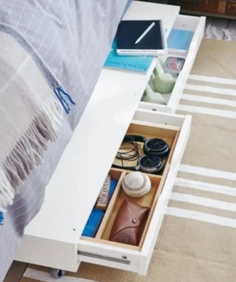 place an Ekby Alex shelf on casters and roll it under the bed to use for storage