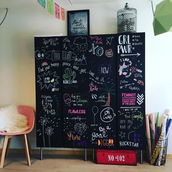 a gorgeous chalkboard storage unit for a teenager room made of 4 IKEA Ivar units and spruced up by the owner