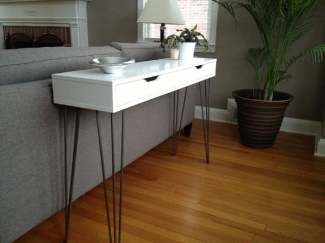 a very slim console table of an Ekby Alex shelf and hairpin legs for a monochromatic space