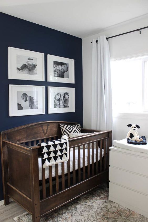 A vintage inspired wooden crib is a chic statement for a nursery and will fit any gender