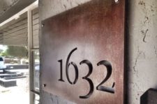 16 an aged metal house number with cutout numbers is a stylish idea for a mid-century modern house