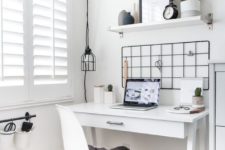 18 a small white sleek desk is a very stylish Scandinavian or minimalist option with a stroage drawer