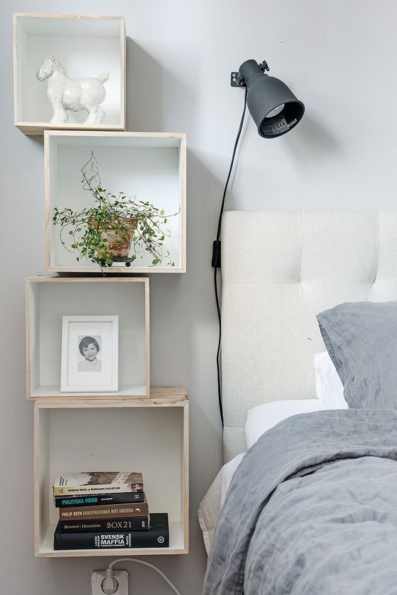 rock an arrangement of box-shaped floating nightstands by the bed, it's a very whimsy idea
