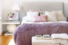 21 a lilac fur throw is a chic accessory for a bedroom, it brings color to the space and can be easily changed