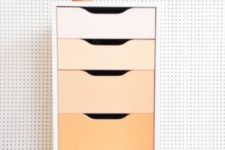 21 renovate an Alex drawer unit with bold contact paper or paints creating a cool ombre effect, here from blush to orange
