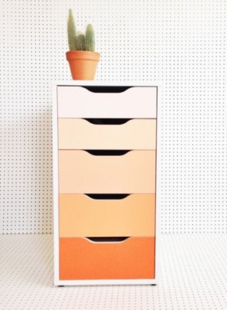 renovate an Alex drawer unit with bold contact paper or paints creating a cool ombre effect, here from blush to orange