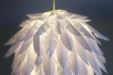 23 a chic paper feather pendant lamp made of an IKEA Regolit lampshade is a cool DIY