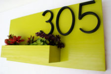 23 a neon planter with house numbers and succulents and blooms will add a touch of color to your outdoor space