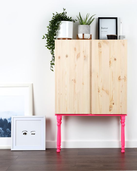 an Ivar cabinet placed on hot pink neon legs is a gorgeous idea, which won't take much time to recreate