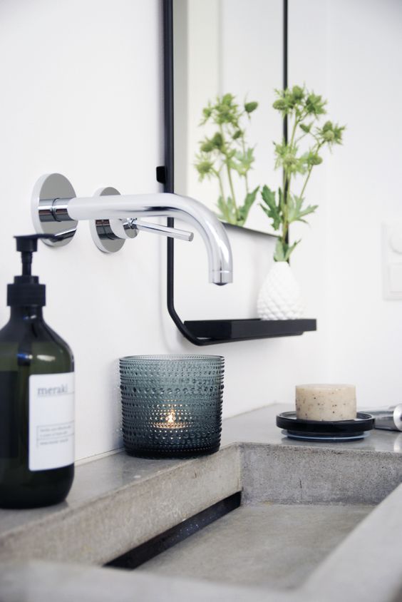 some candles and greenery will add charm to the bathroom