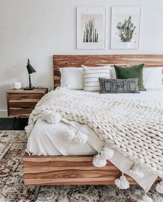 various fabrics, colorful velvet and chunky knit with tassels make the bed eye-catchy and inviting
