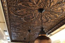 28 a pressed tin metal ceiling shows off a beautiful vintage pattern that adds an exquisite touch to the space