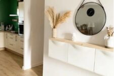 an IKEA Trones piece with a stained countertop is pretty and smart console table for an entryway