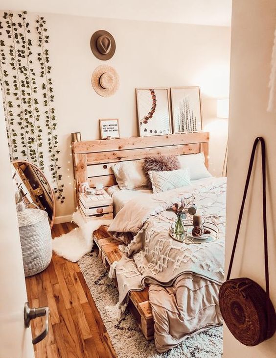 a bed built of pallet wood is a cool and creative idea to give it a less industrial look