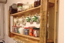 03 a recycled pallet rack for a kitchen features glass and mug storage and jars with various stuff
