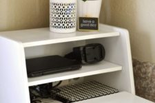 04 a charging station in a vintage breadbox is a fun and catchy idea for a kitchen, no one will guess