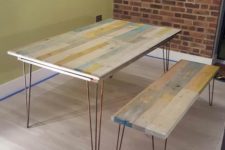 05 an upcycled pallet dining table and matching benches with hairpin legs and touches of whitewashed colors