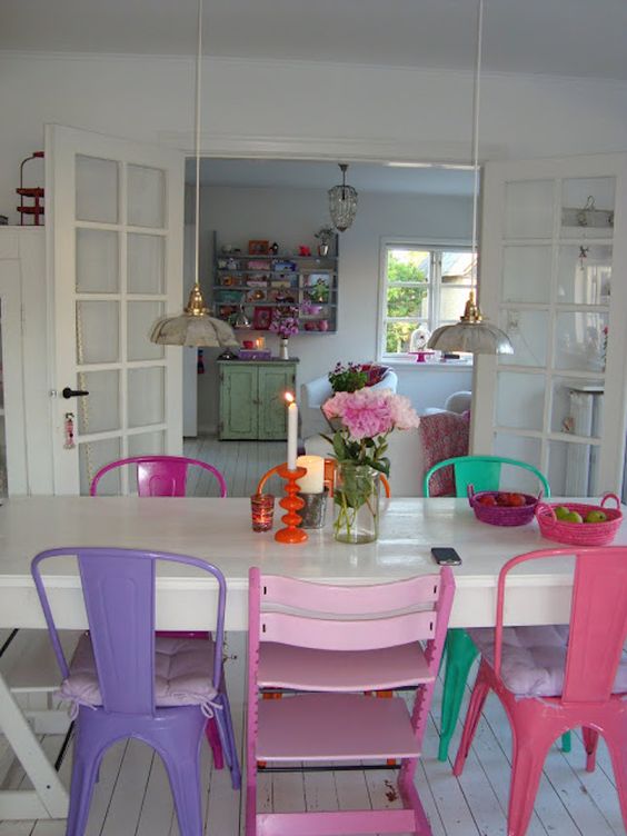 colorful metal chairs - the same chairs and different shades for an eclectic and colorful dining room