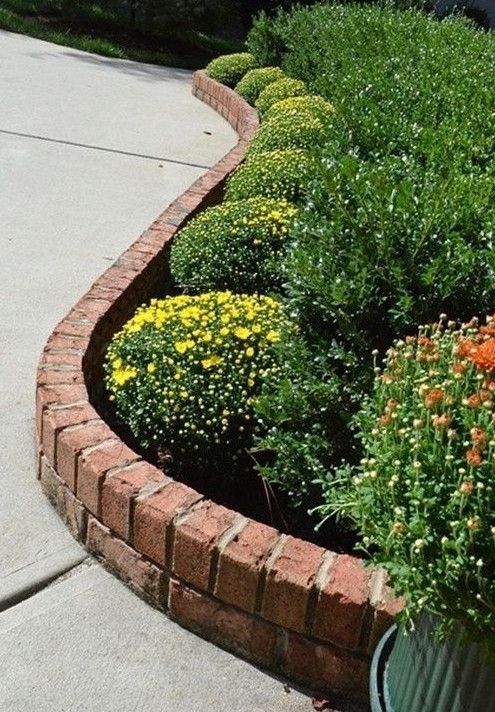 red brick garden bed edging is a stylish idea with a very neat final look, it always works