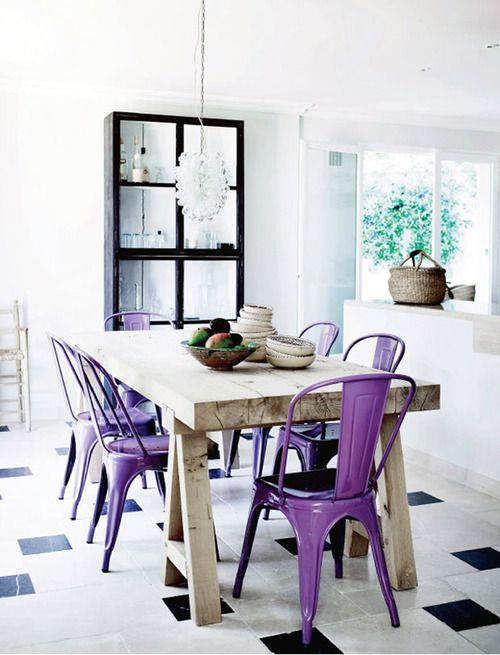 classic metal chairs painted purple add color to the space and spruce the neutral kitchen up