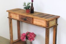 07 a rustic pallet console with a slatted top and shelf plus a small drawer for a small entryway