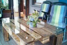 12 an outdoor contemporary meets rustic dining table of stained pallet wood and with a glass tabletop