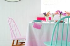 12 pastel painted chairs with stained legs look very cute and chic, they will add color to any space