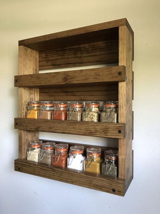 make a stylish rustic pallet shelf with several layers to store spices and other stuff in the kitchen