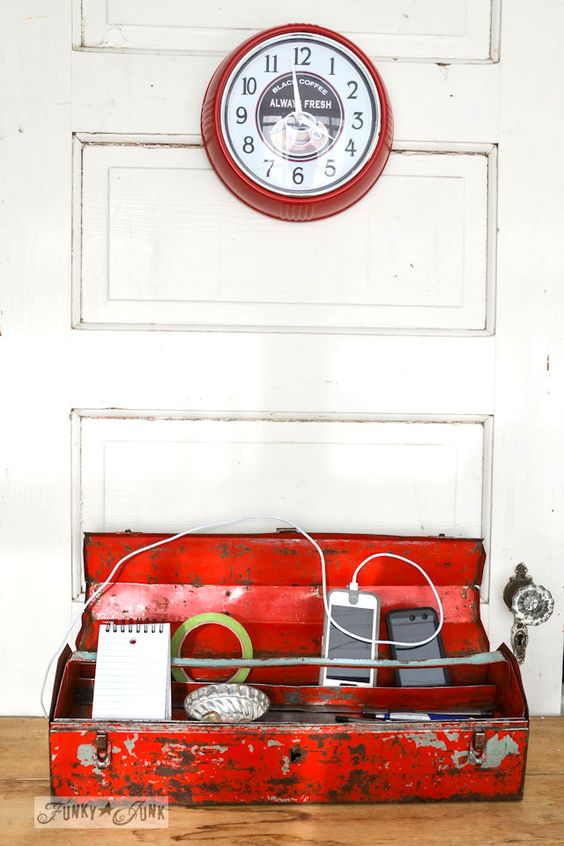 a rusty and shabby chic red box turned into a charging station cna be used in any room